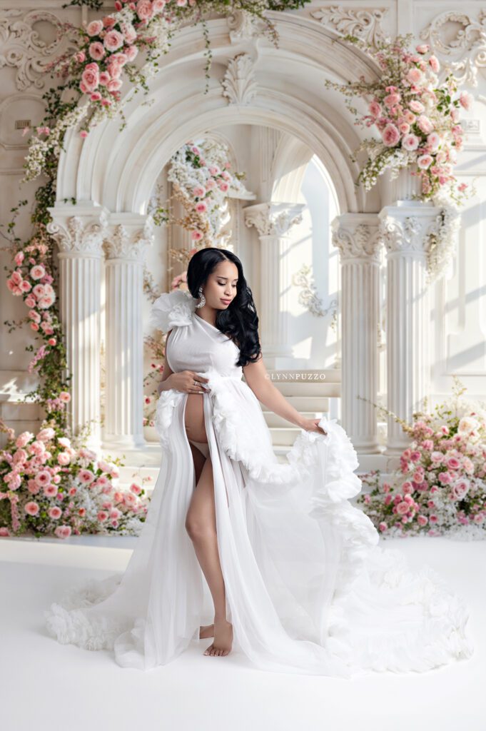Fine art white maternity dress studio session