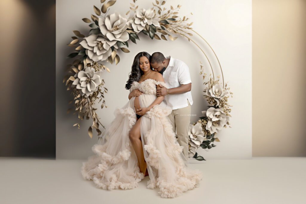 Luxury studio maternity photography showcasing couple maternity portraits